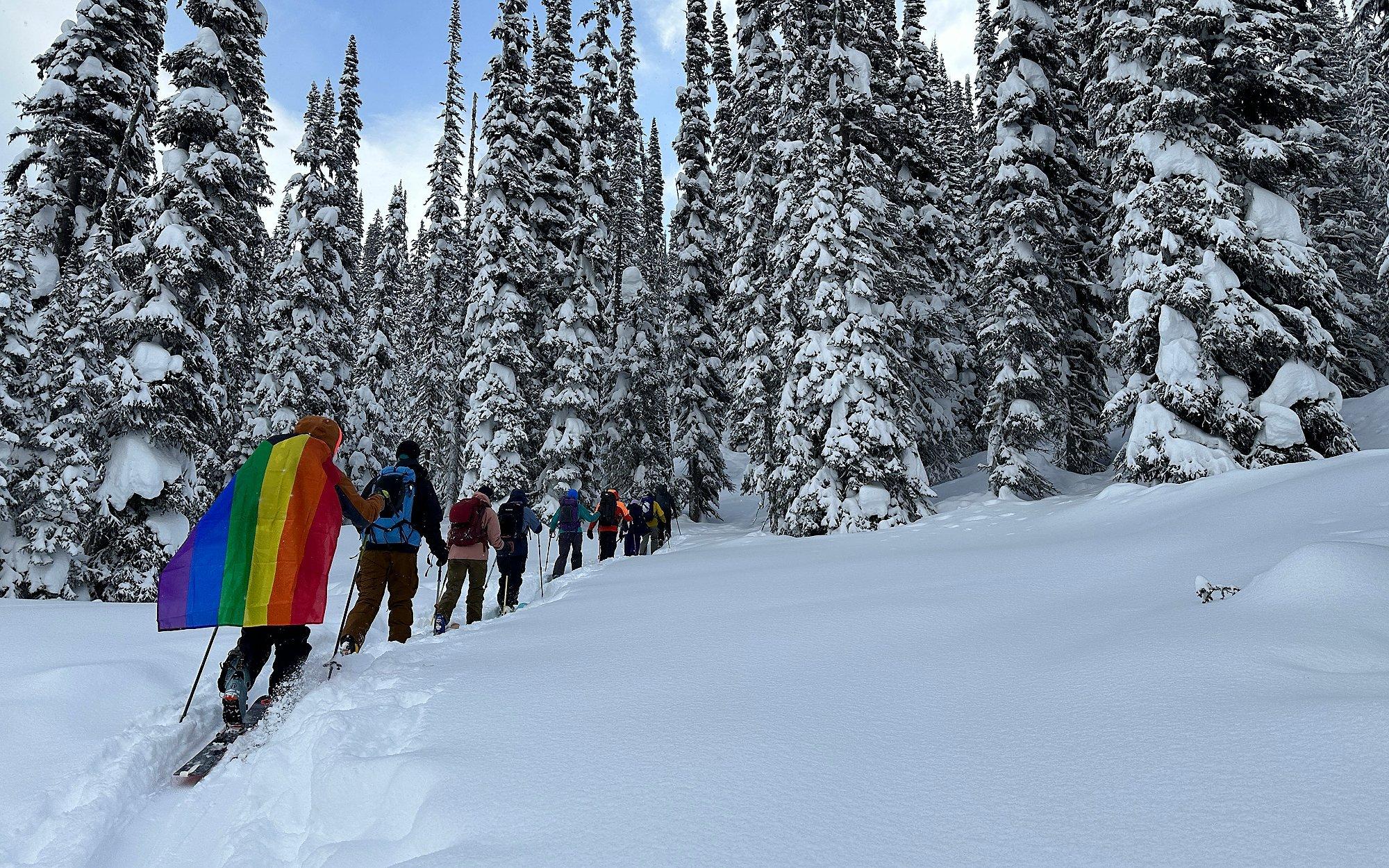 Open Mountains friends skin their way through the backcountry on skis. 