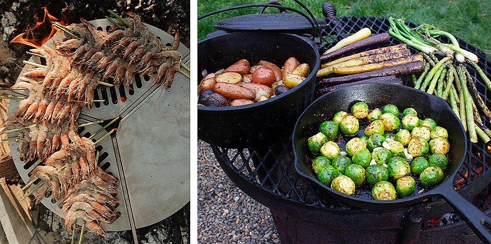Close up of shrimp being grilled over a fire. Vegetables being cooked over a fire pit. 
