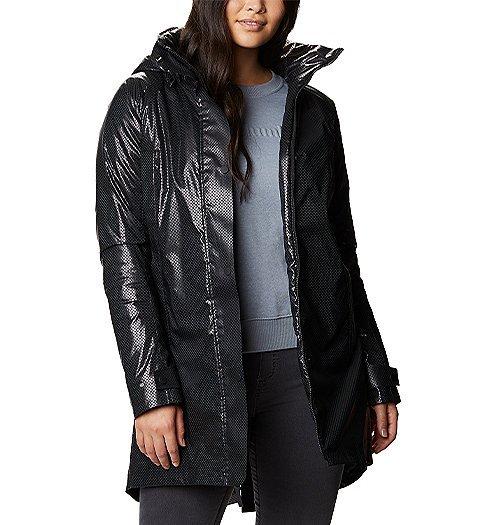 Woman wearing an Omni heat Black Dot jacket.