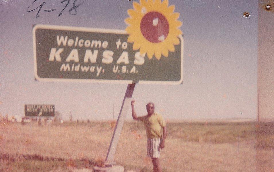 Benjamin and Frances Graham are pictured in a snapshot standing in front of a sign that reads “Missouri Information Center.”