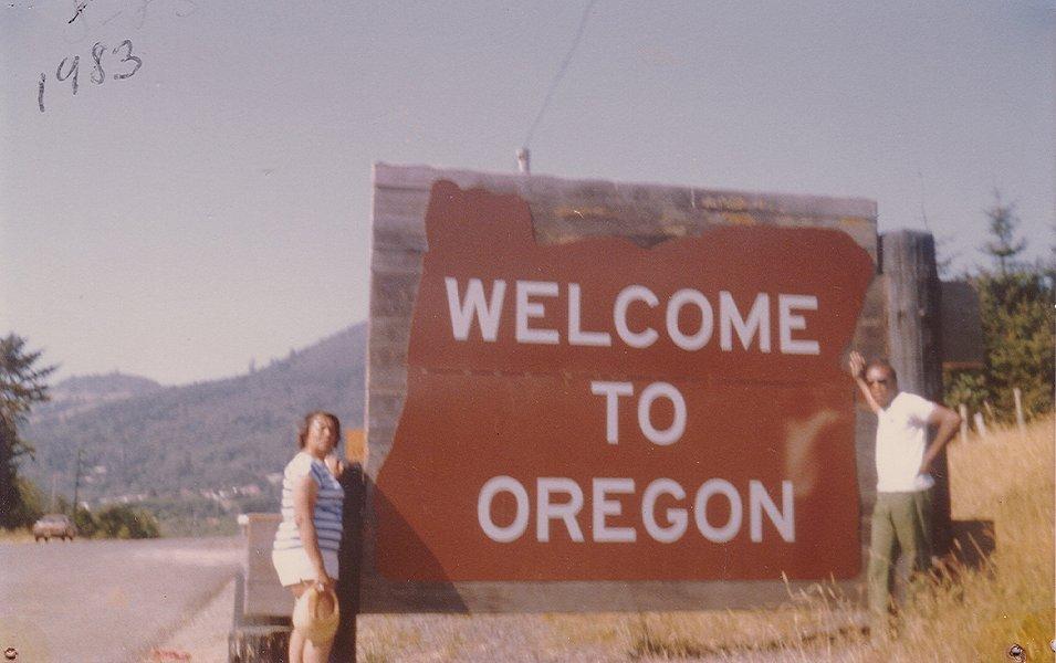 Benjamin and Frances Graham are pictured in a snapshot standing in front of a sign that reads “Missouri Information Center.”
