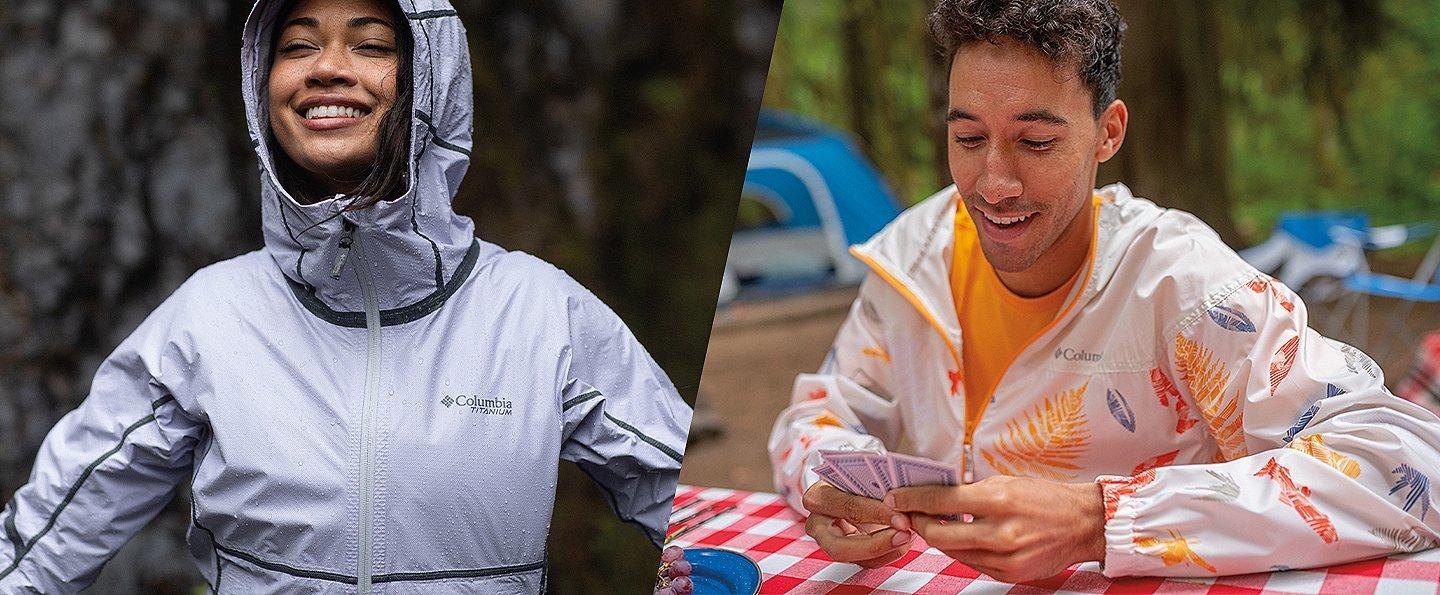 (Left) A woman smiles widely while wearing a light purple Columbia Sportswear rain jacket. (Right) A man wearing a white Columbia Sportswear windbreaker sits at a picnic table in a campground playing cards.