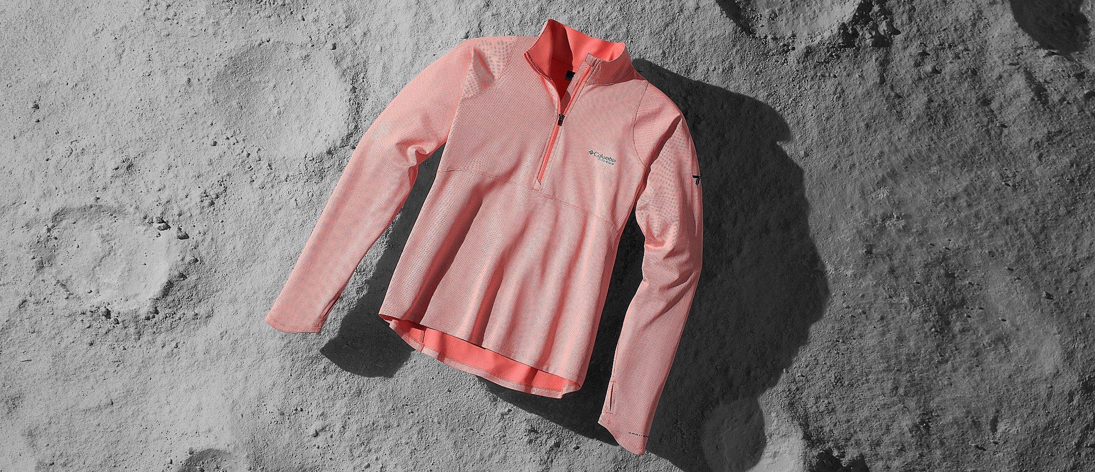 Omni Shade Sun Deflector shirt on a moon like surface. 