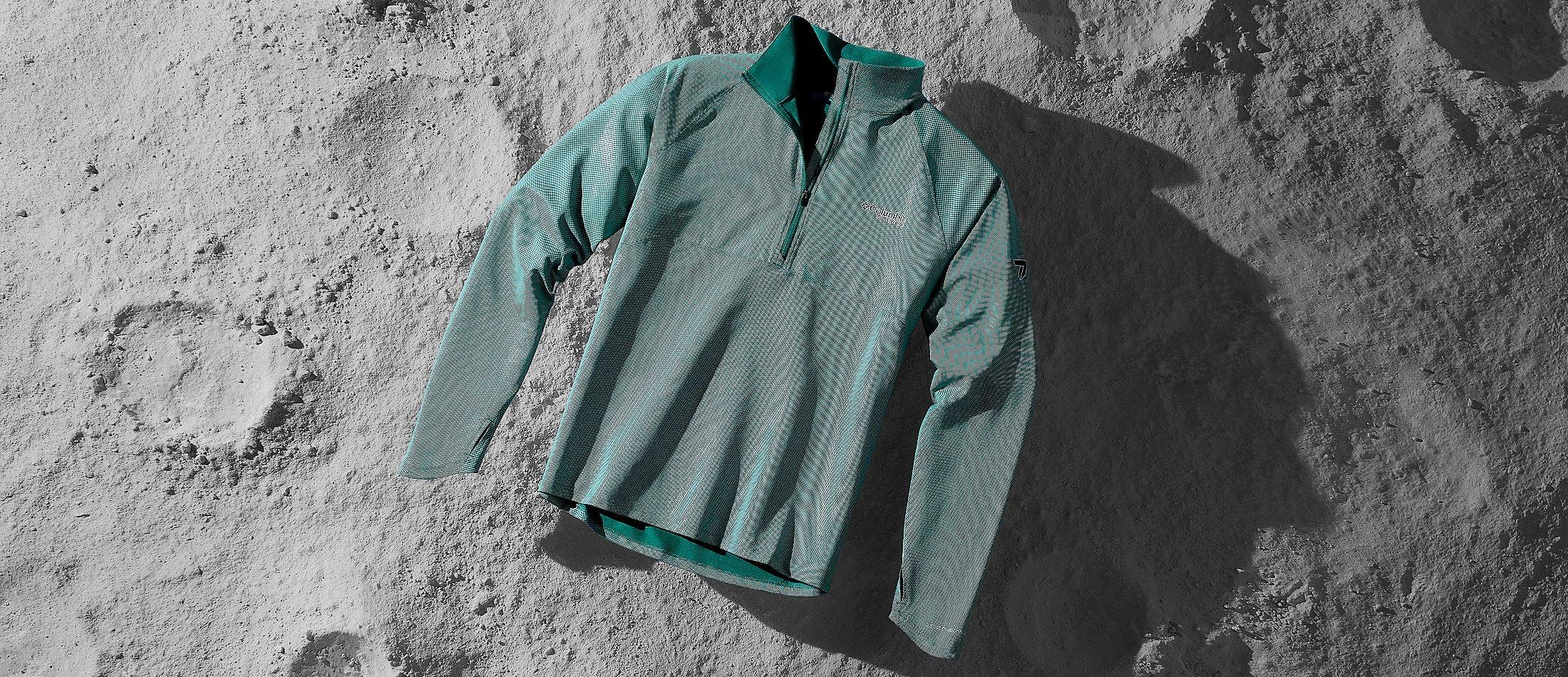 Omni Shade Sun Deflector shirt on a moon like surface. 