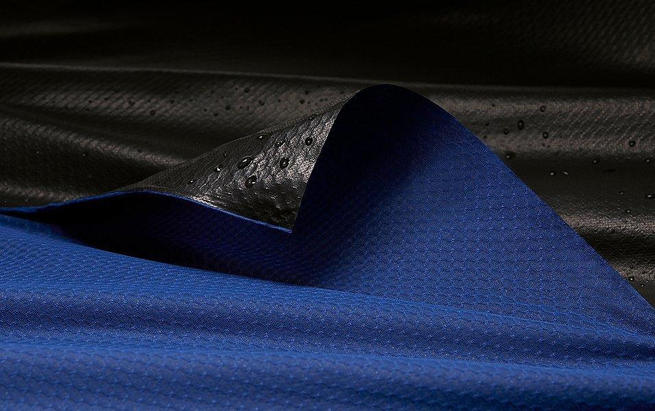 A close-up shot of a blue and black textile fabric.