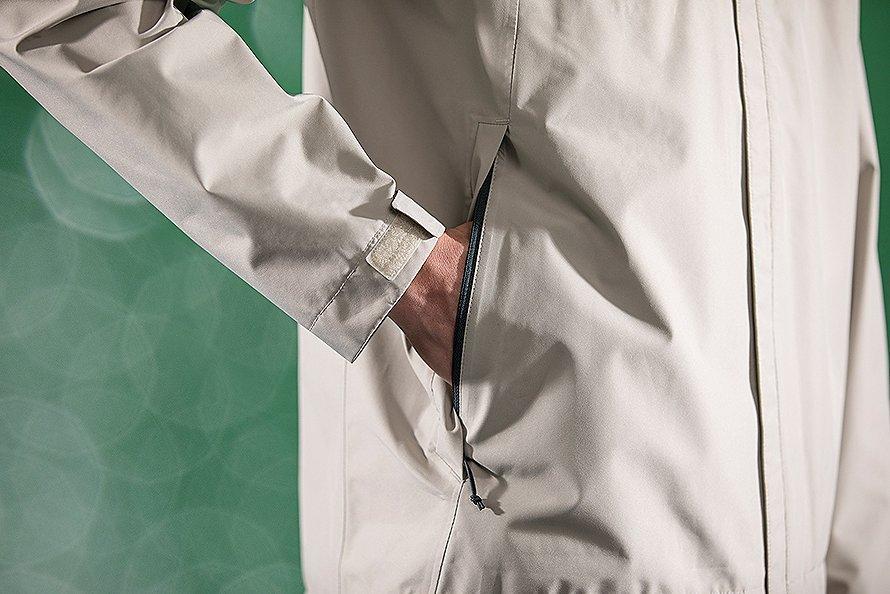 Two zippered hand pockets with stretch-mesh interior securely protects 		essentials