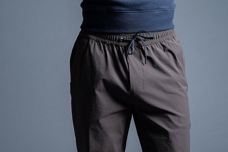 Full elastic waist with adjustable internal drawcord and faux fly