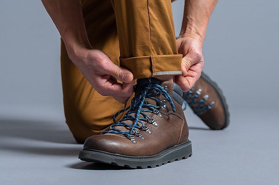 Unique Mountain Hardwear roll up snap feature with reflective detail