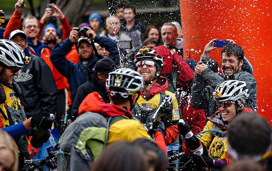 Crowd celebrating the end of a race. 