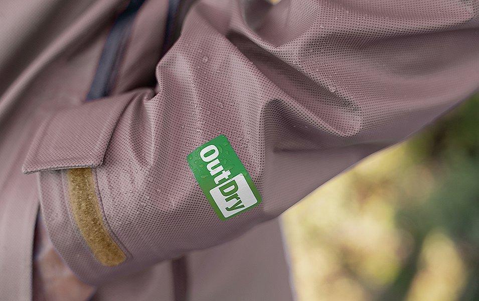 The logo of Columbia Sportswear’s OutDry™ Extreme technology is pictured on the sleeve of a rain jacket. 