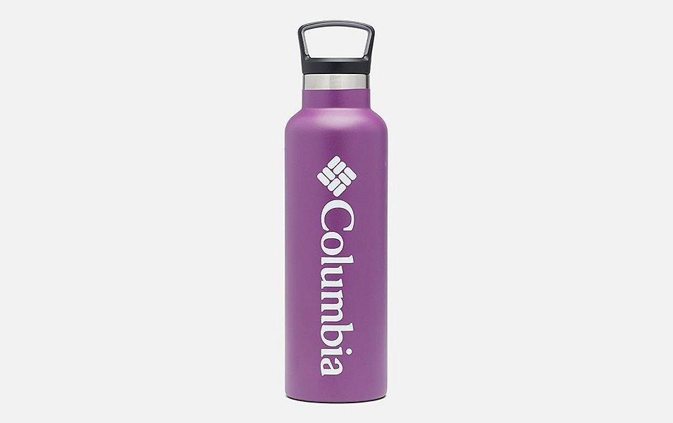 A product image of a purple Columbia Sportswear double-wall vacuum water bottle with a white background. 
