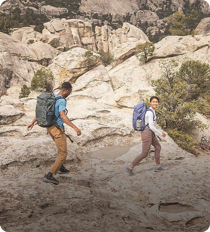 two hikers in desert utah