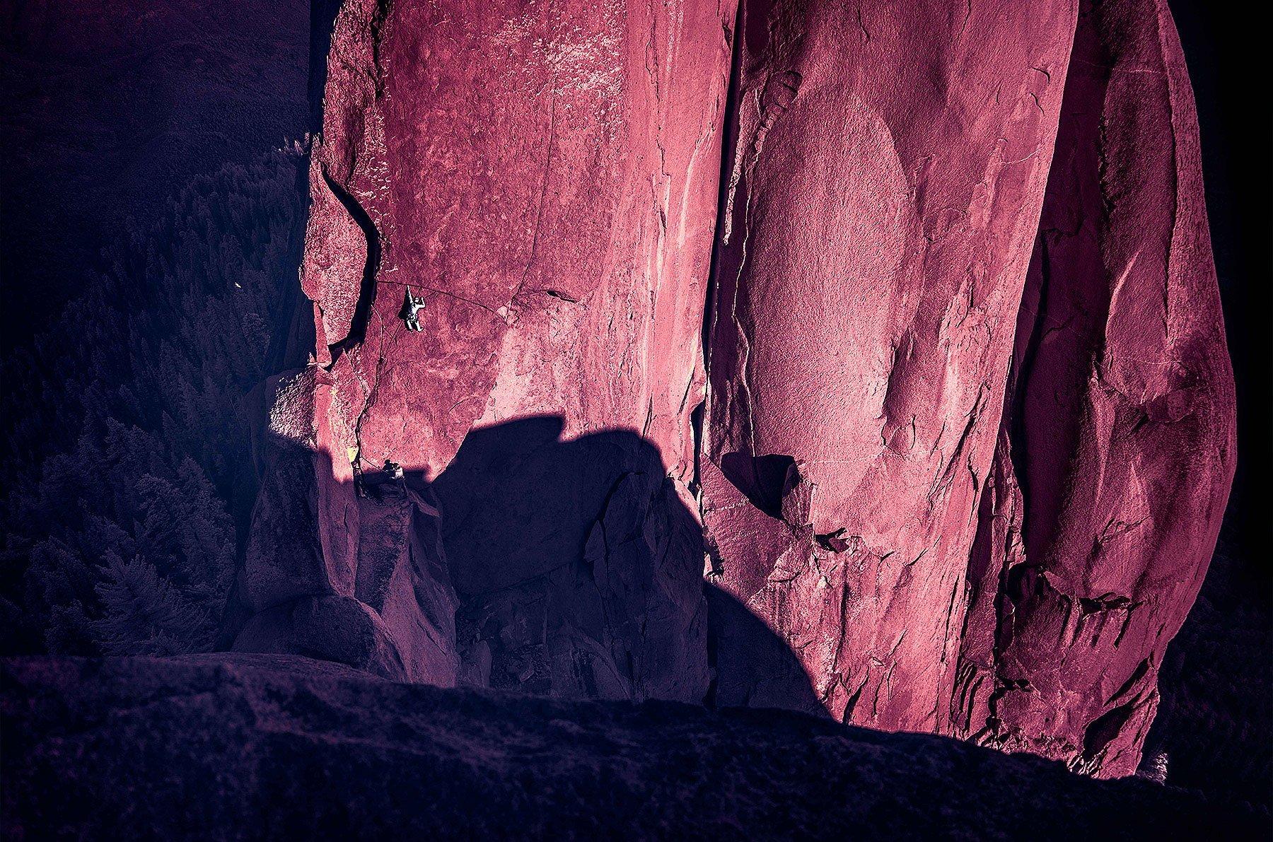 infrared image, big rockface, little Miranda climbing off in the distance in the Needles.