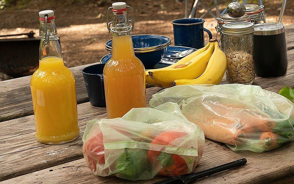 Food and drinks laid out for a lunch. 