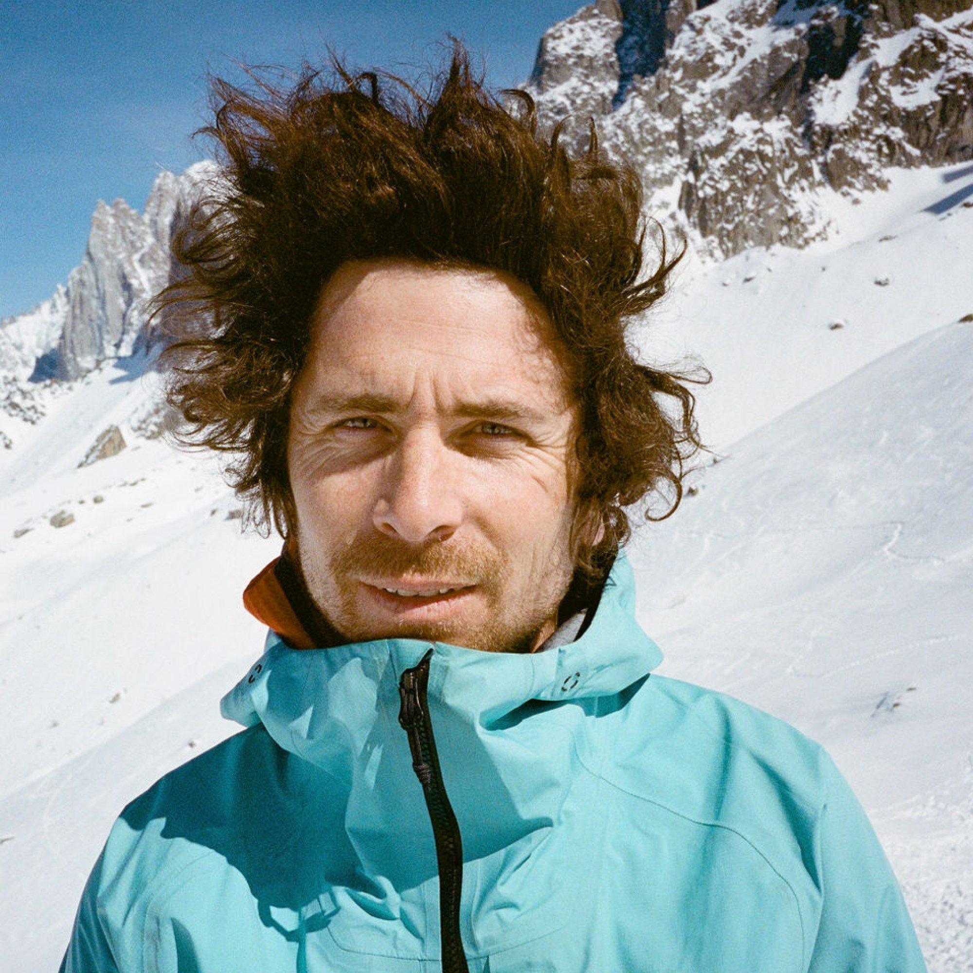 Between runs in a moment of pause, professional ski alpinist Vivian Bruchez’ wild helmet hair stands on end.