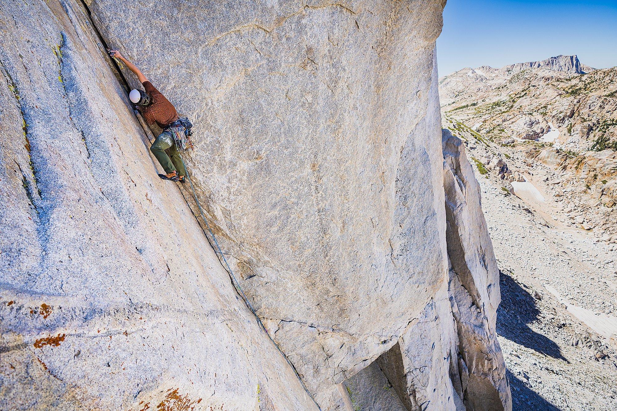 Casey climbs in the Crater Lake™ Short Sleeve and Chockstone™ Alpine LT Pant.
