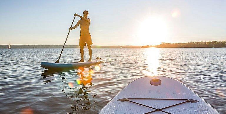 Learn more about how to dress for success on the water with the right clothing for paddleboarding.