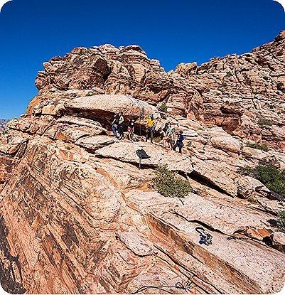 participants from the 2022 AMGA LGBTQIA2S+ SPI Course on the rock during the course