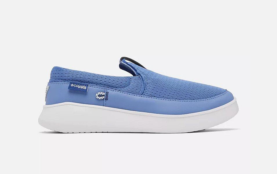 Product shot of Columbia Sportswear’s Men’s PFG Slack Tide Slip shoe set against a white background. 