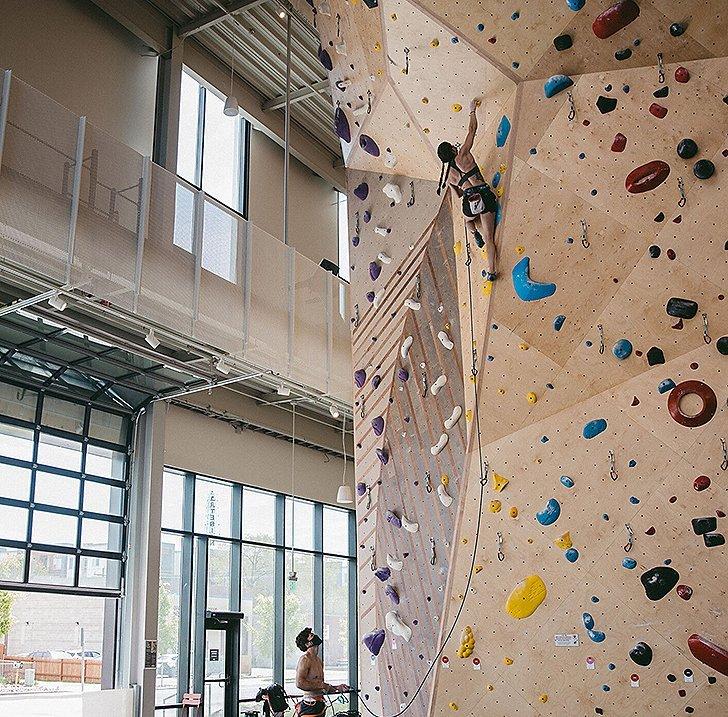 Kyra lead climbing