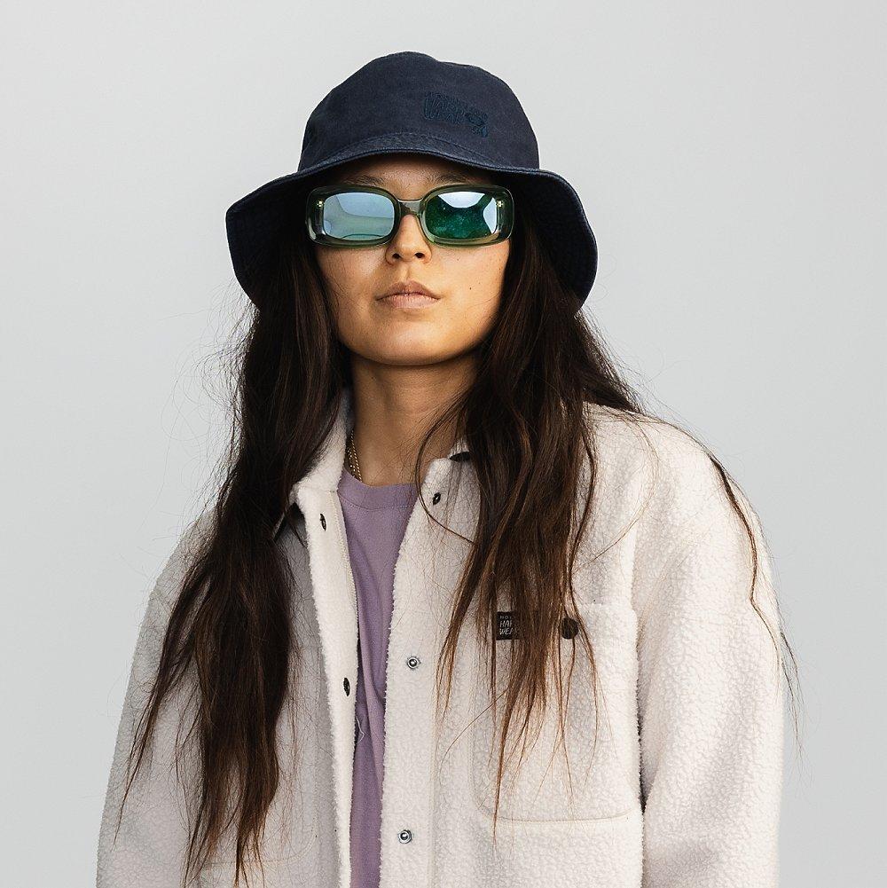 Studio shot of the HiCamp Fleece and the Bucket hat.