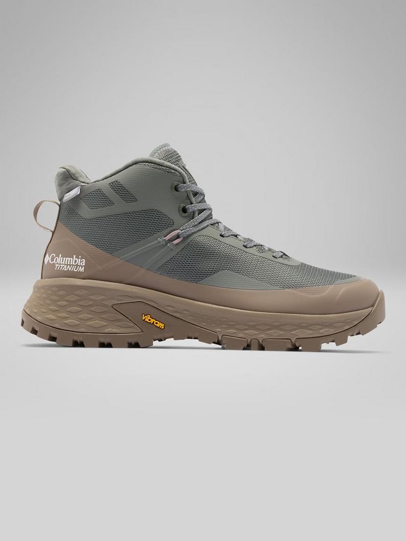 Olive and tan hiking boot with mesh panels and aggressive tread sole, shown in side profile.