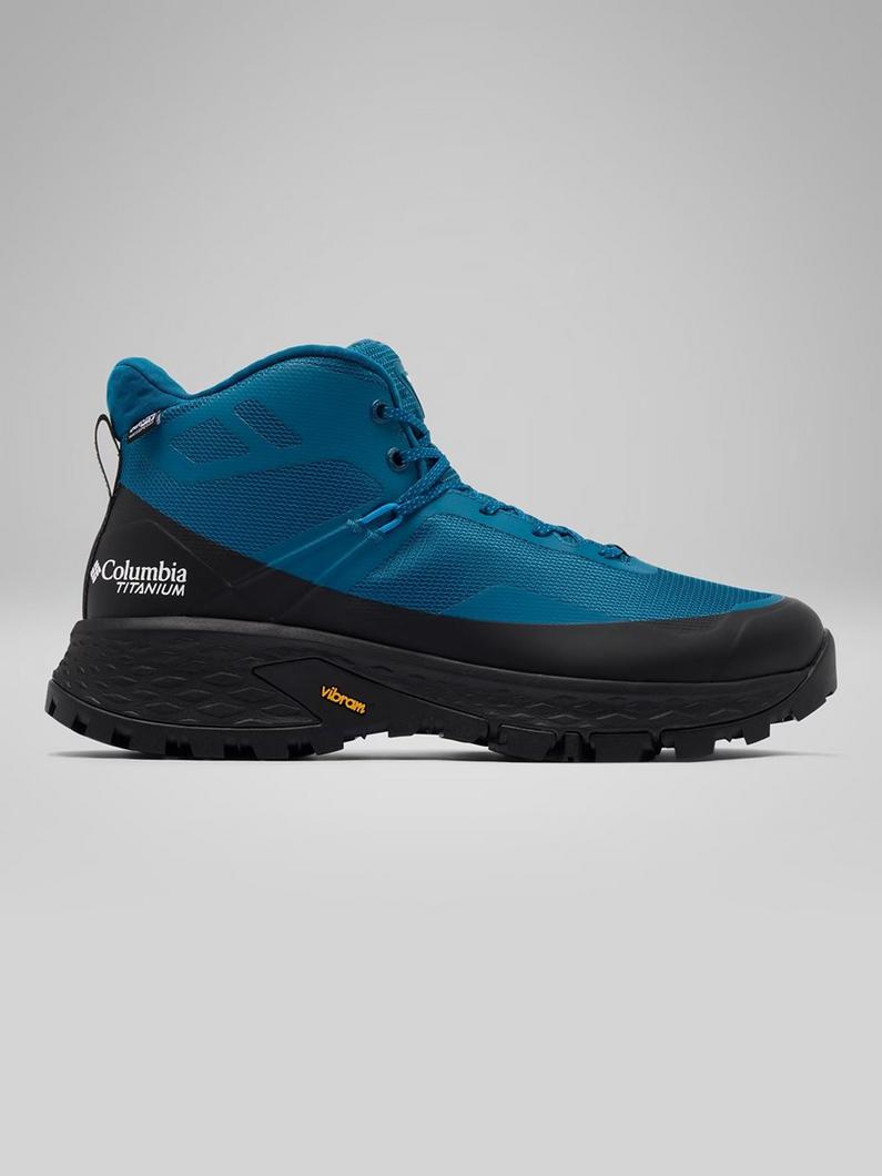 Teal and black mid-height hiking boot with mesh upper and Vibram sole, shown in side profile.