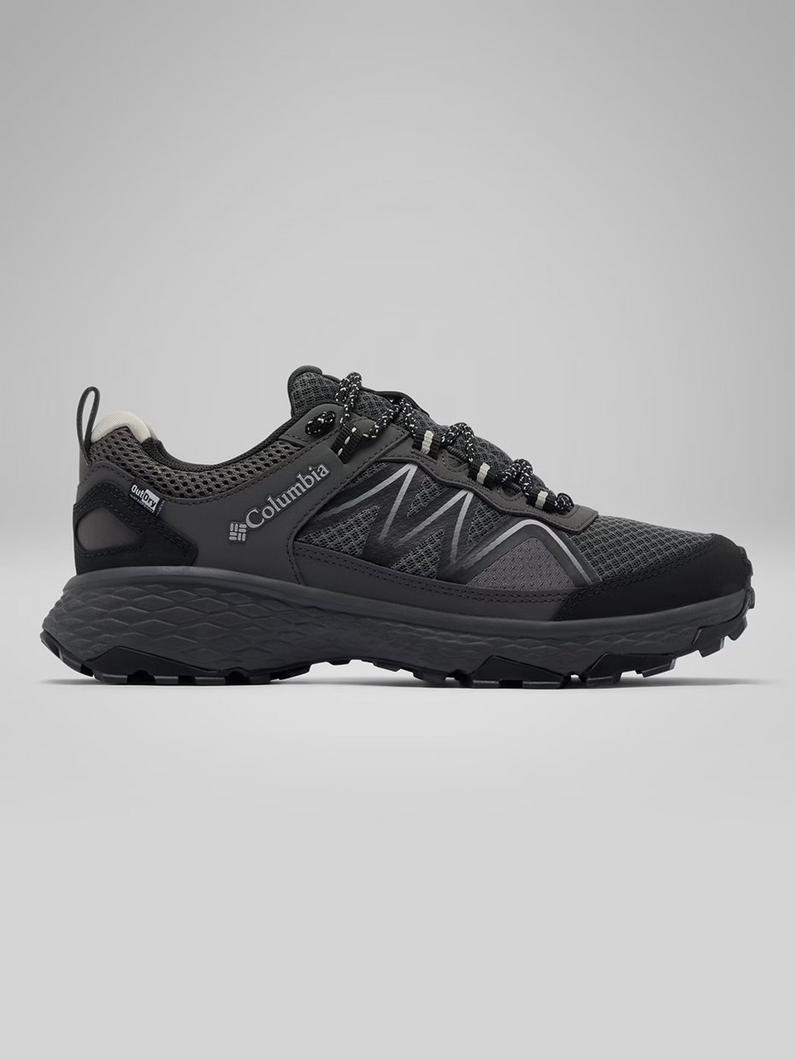 Black and gray trail running shoe with mesh upper, lace-up closure, and rugged sole.