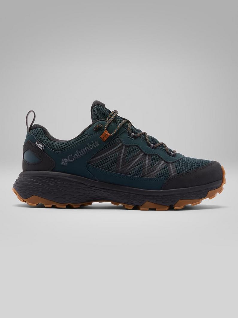 Dark teal and black trail running shoe with mesh upper, protective toe cap, and tan rubber outsole.
