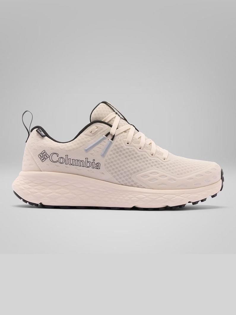 White athletic sneaker with textured mesh upper, chunky cushioned sole, and black accents.