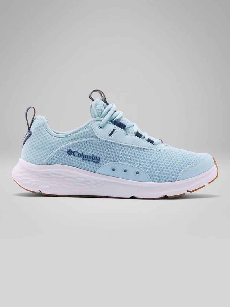 Light blue athletic sneaker with white sole and brown gum rubber outsole, featuring mesh upper.