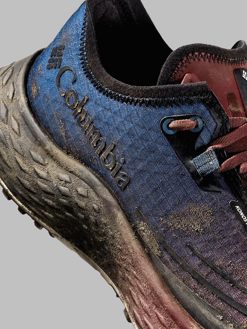 Close-up of hiking shoe with iridescent blue and copper upper, quick-lace system, and rugged sole.