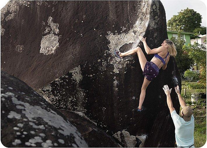 Kyra Condie boulders in Puerto Rico
