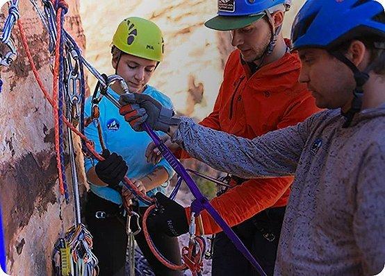 The Mountain Guides set up a proper top anchor