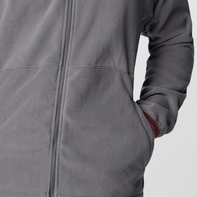 Model with hand in pocket.