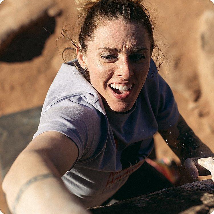 close-up of Alex Johnson bouldering