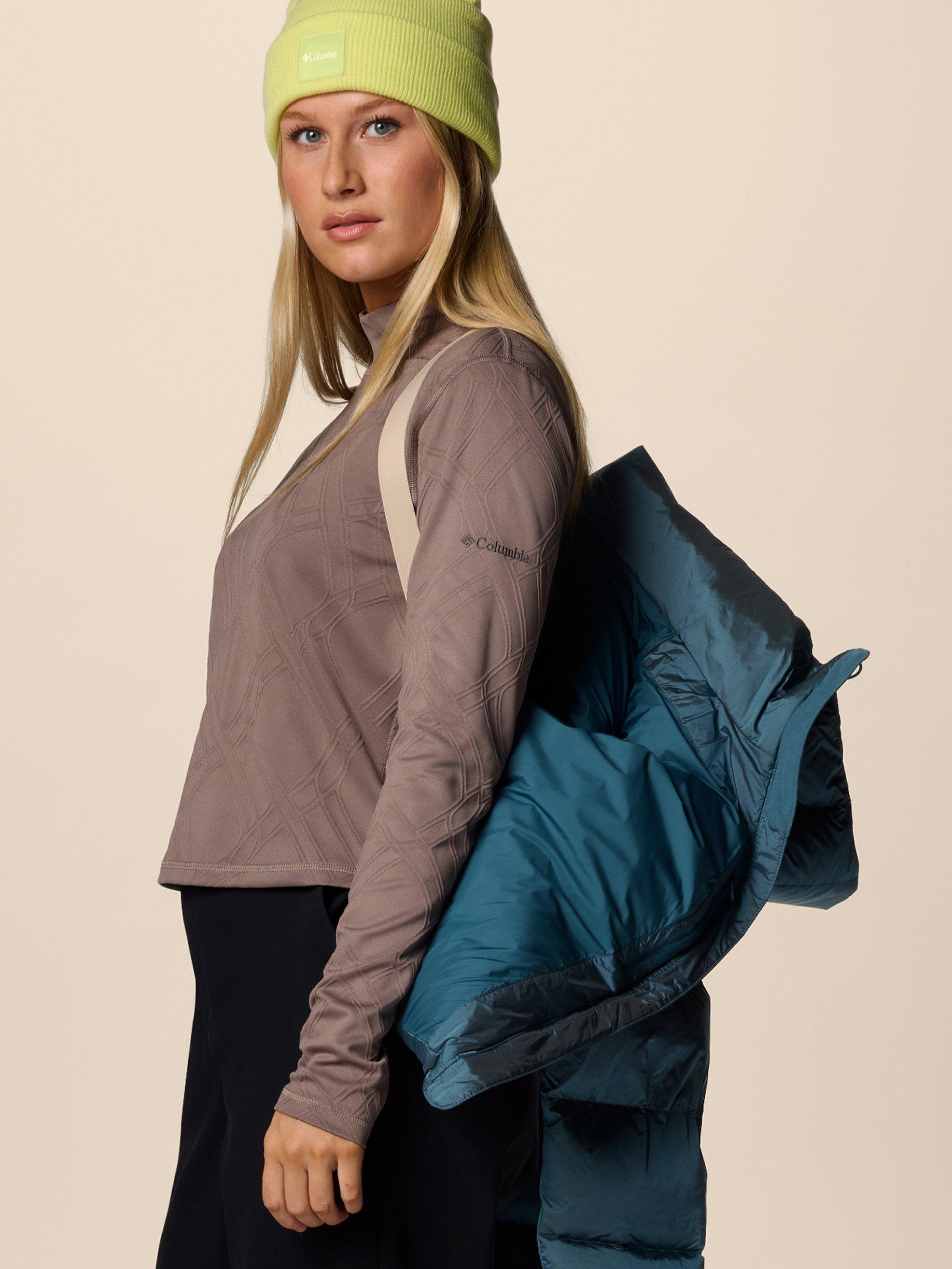 Model showing how the backpack straps work.