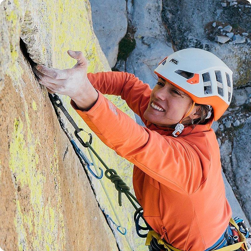 Close-up of Miranda Oakley reaching for a hold