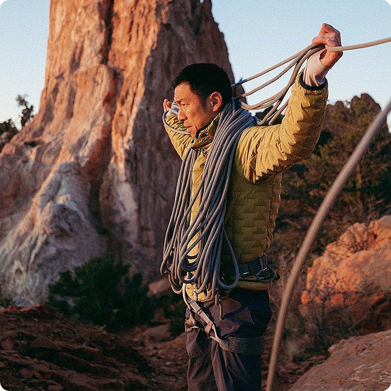 Cody coiling the rope before a climb