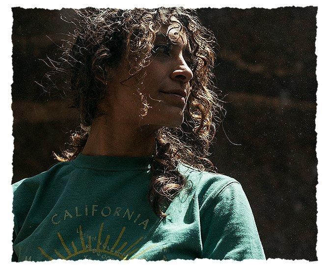 Close up profile shot of a hiker looking in the distance