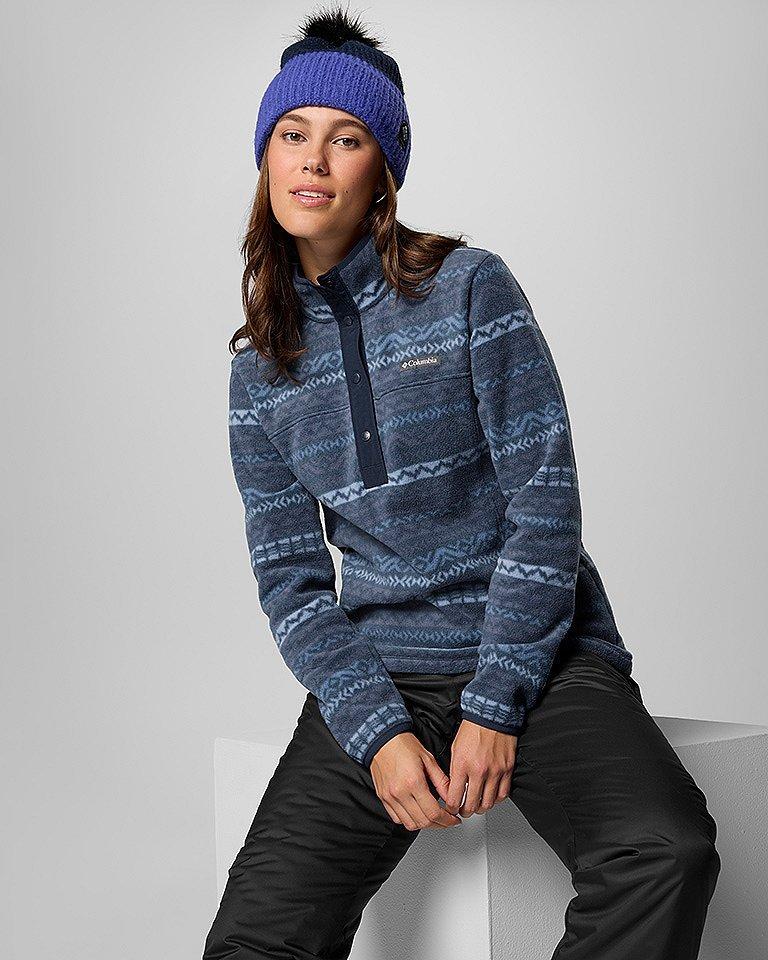 A woman in an outdoor outfit.