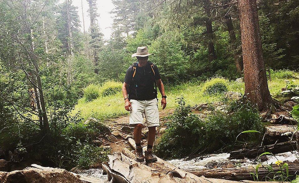 Man hiking in the woods.