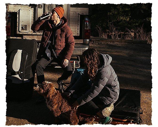 Getting ready to go boulder at the tailgate, drinking coffee, getting the crash pads ready