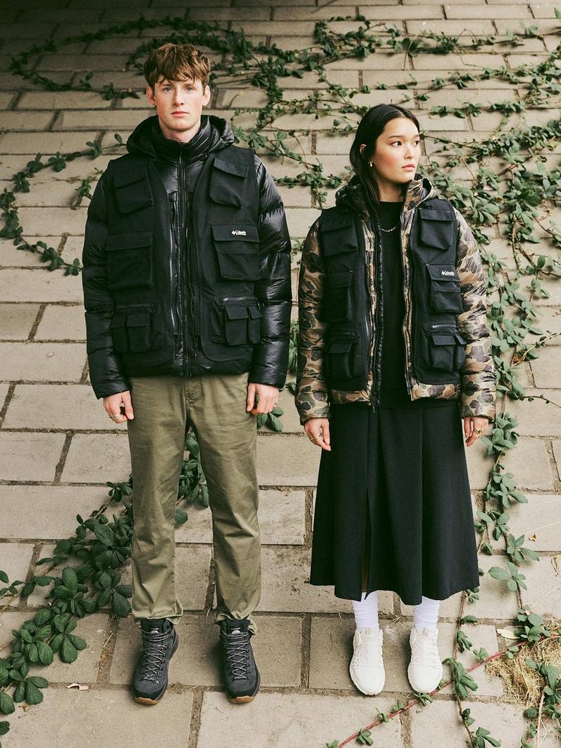 Man and woman standing side by side in CSC1938 gear.