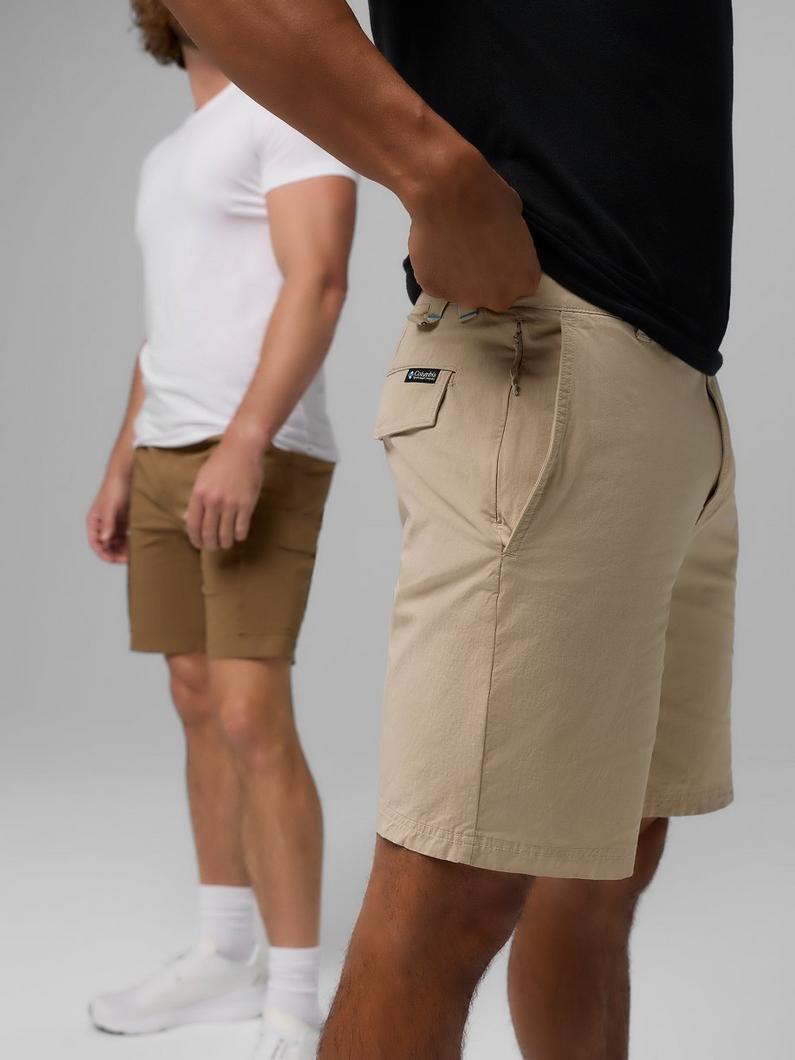Close-up of a woman and man in ROC shorts.