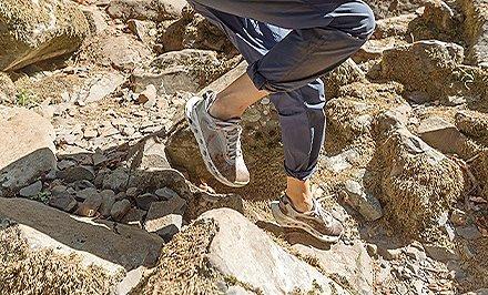 Close-up of a person wearing shoes with Omni-Grip LT.