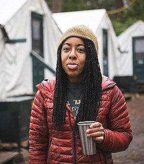 Genevive looks at the camera with her tongue out.