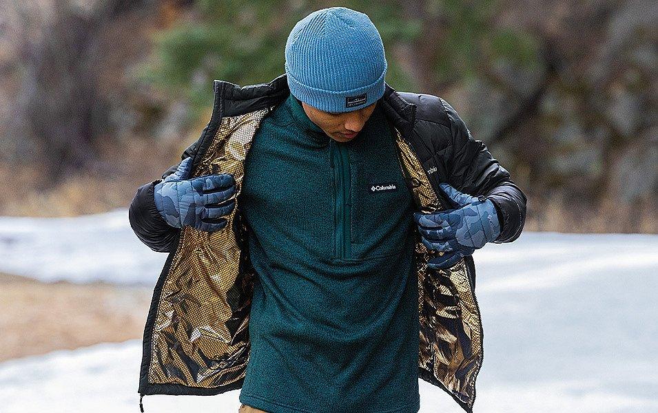 Man showing the gold liner of a Columbia Sportswear Omni-Heat Infinity Jacket