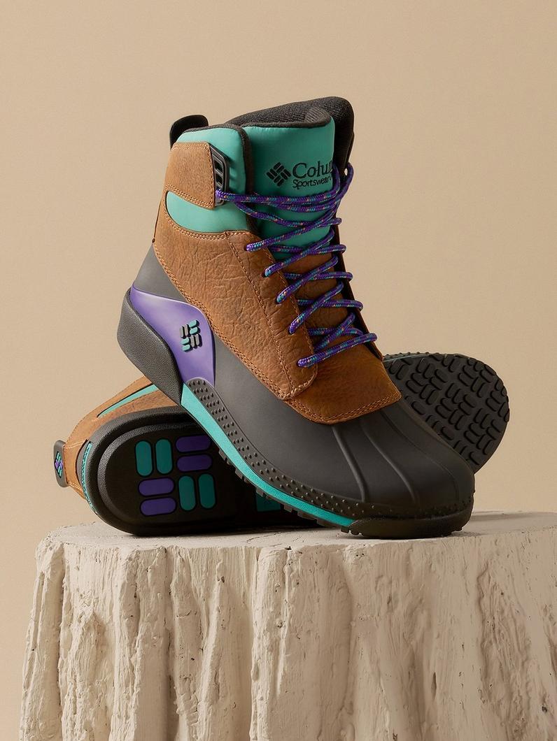 Boot sitting on a stylized display log.
