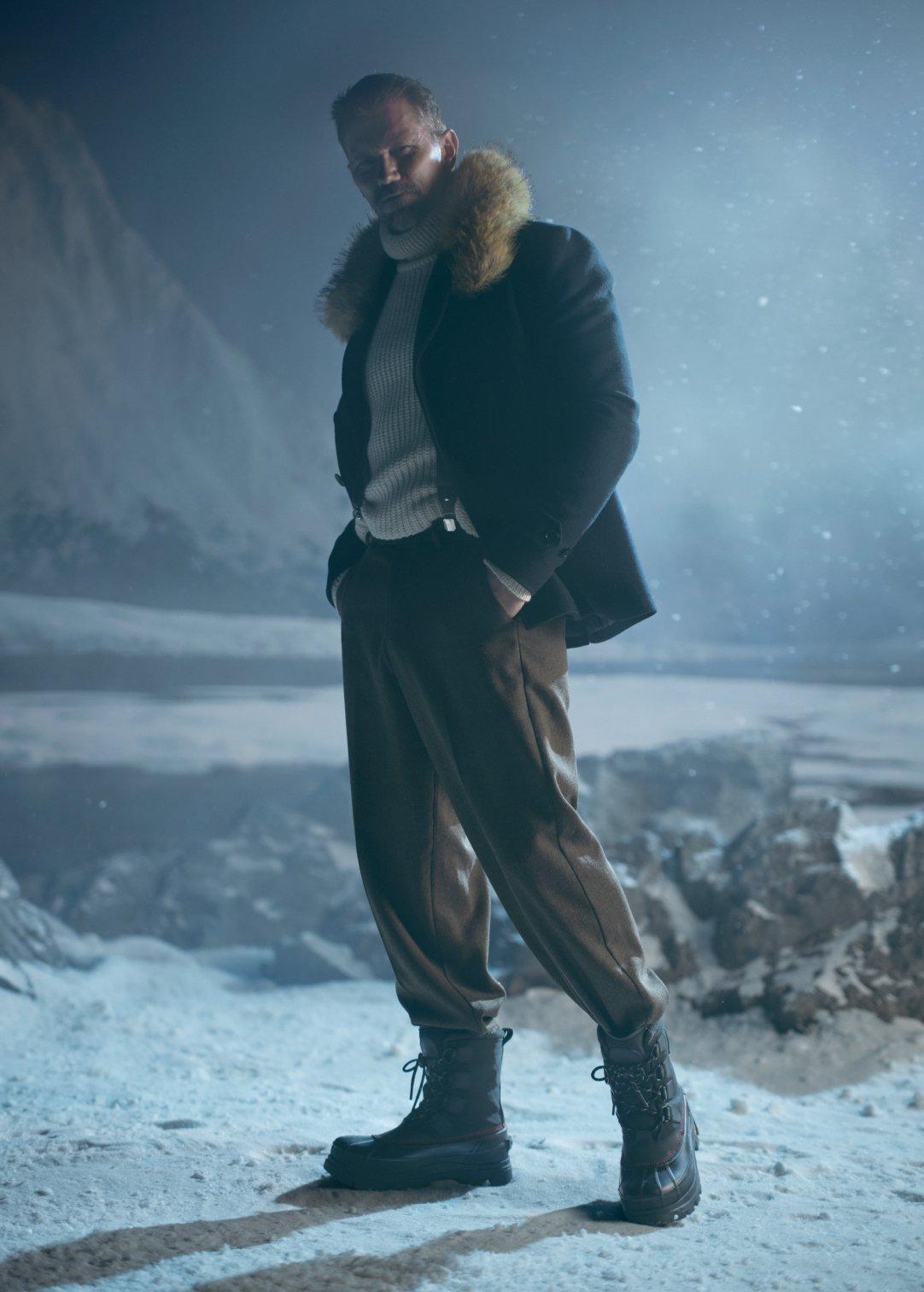 man in an arctic background wearing caribou horizons